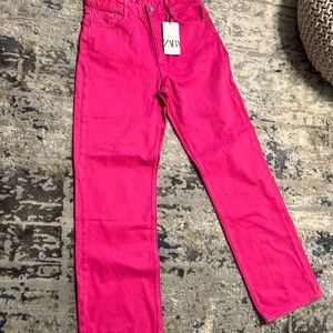 Brand new, Pink, high-waist, wide-leg jeans.